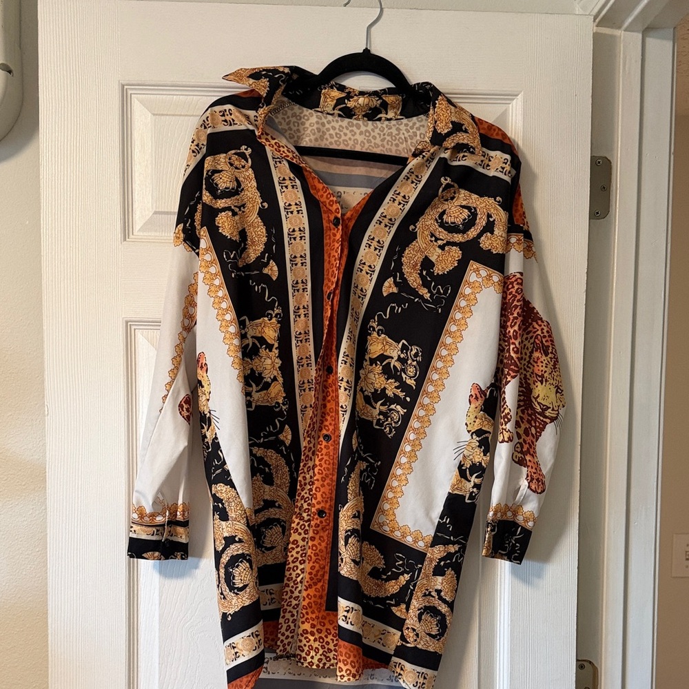 Elegant Long Sleeve Dress with Black and Orange Pattern